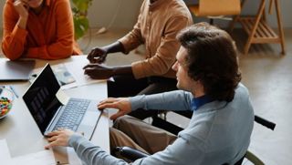 Image Of People Smiling And Talking In Office (5)