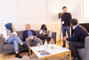 A Group Of People In Conversation