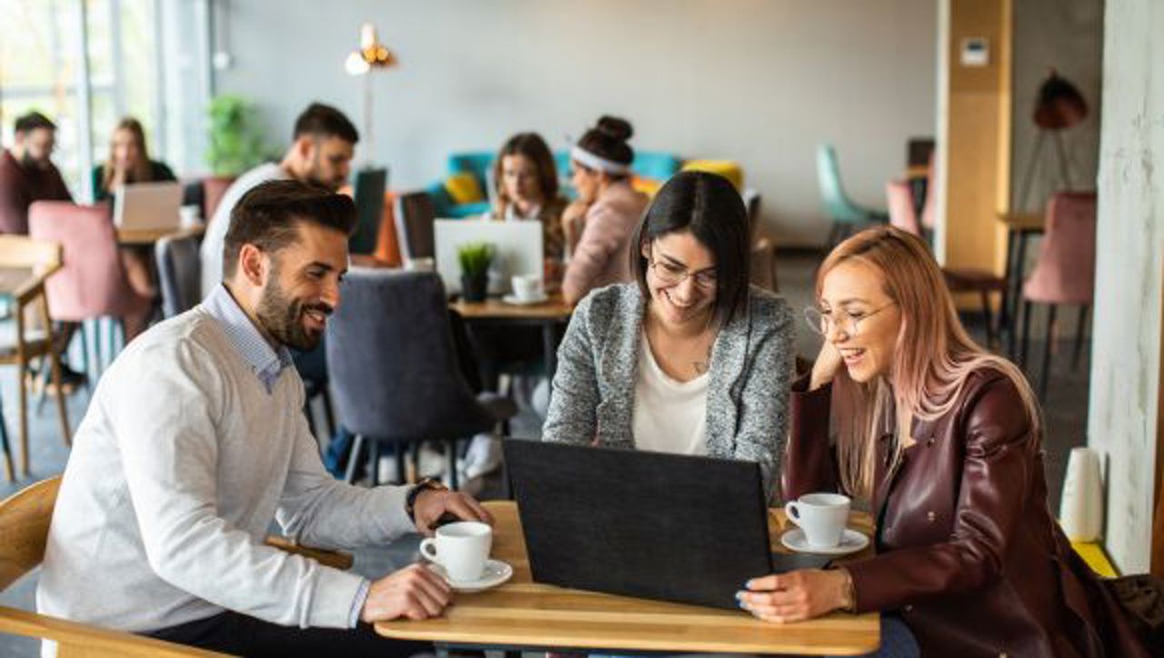 Image Of People Smiling And Talking In Office (13)